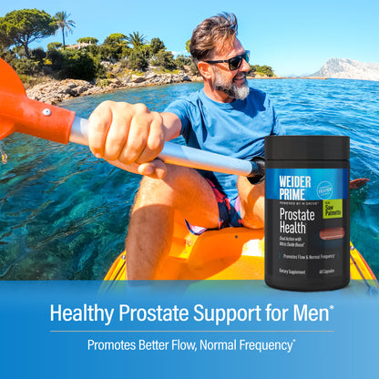 Smiling bearded man paddling a yellow kayak on clear blue water, with the WEIDER Prime Prostate Health bottle. Text: "Healthy Prostate Support for Men*. Promotes Better Flow, Normal Frequency*".